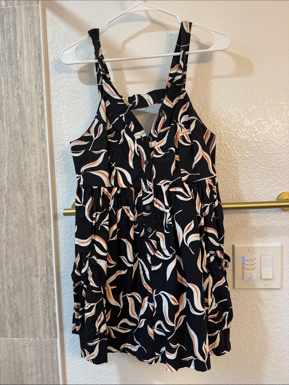 Anthropologie Black Romper with Cream & Tan Leaf Print